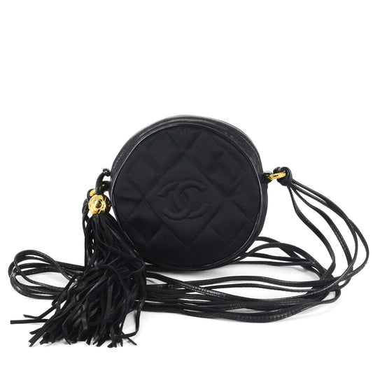 CHANEL Round Quilted Satin Mini Tassel Crossbody