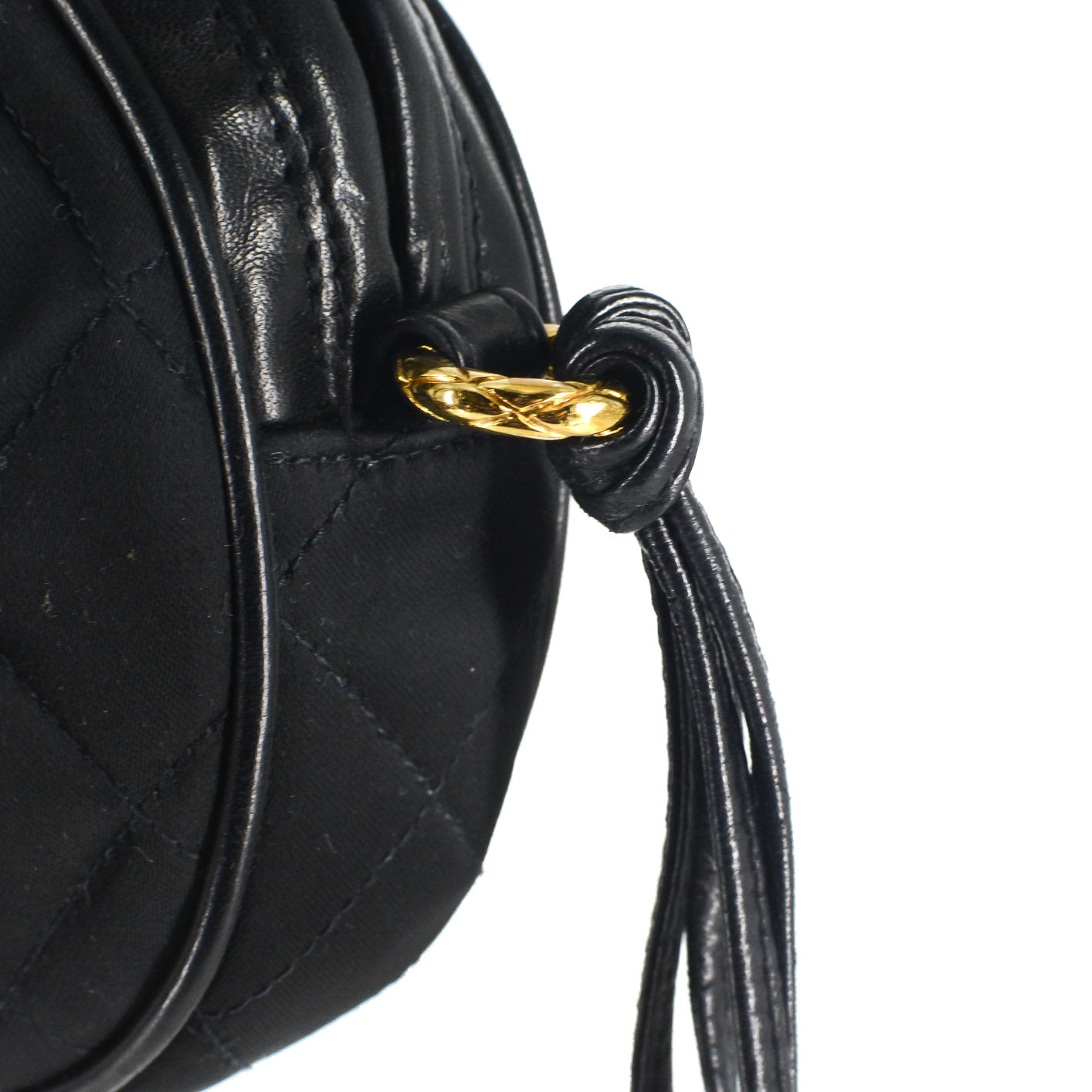 CHANEL Round Quilted Satin Mini Tassel Crossbody