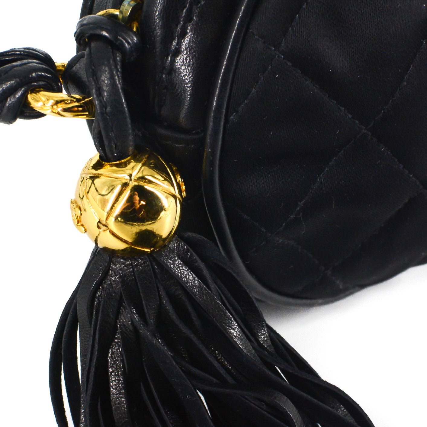 CHANEL Round Quilted Satin Mini Tassel Crossbody